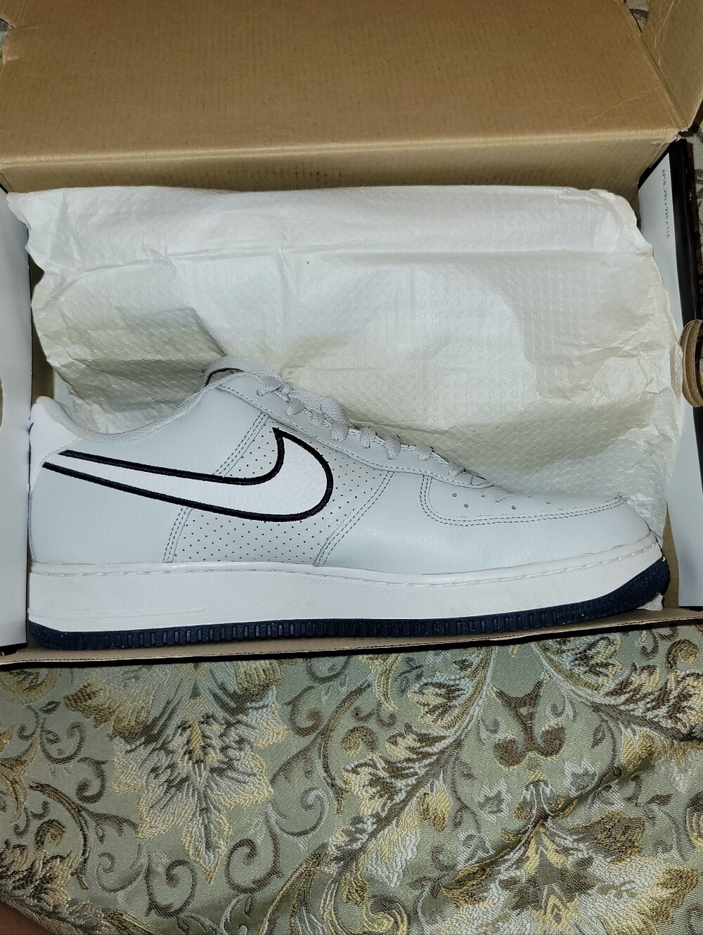 Nike White Leather Low-Top Sneakers with Black Swoosh